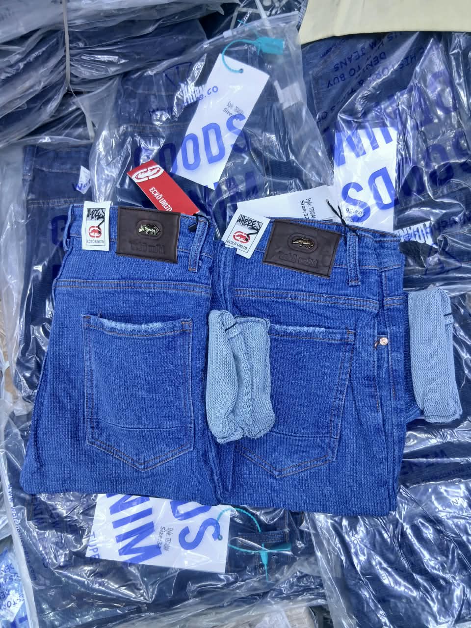Pantalon en jean bleu avec poches arrière